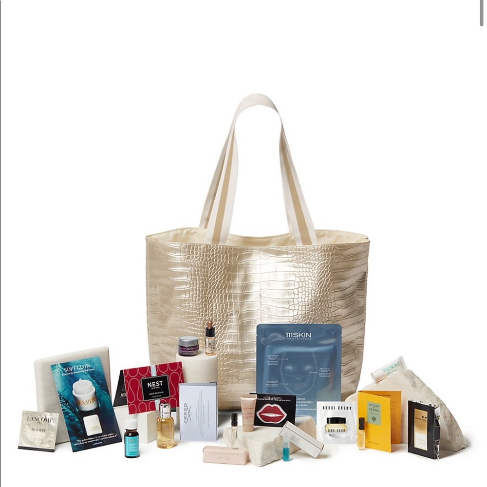 Sak fifth avenue gold tote bag w/ luxury samples